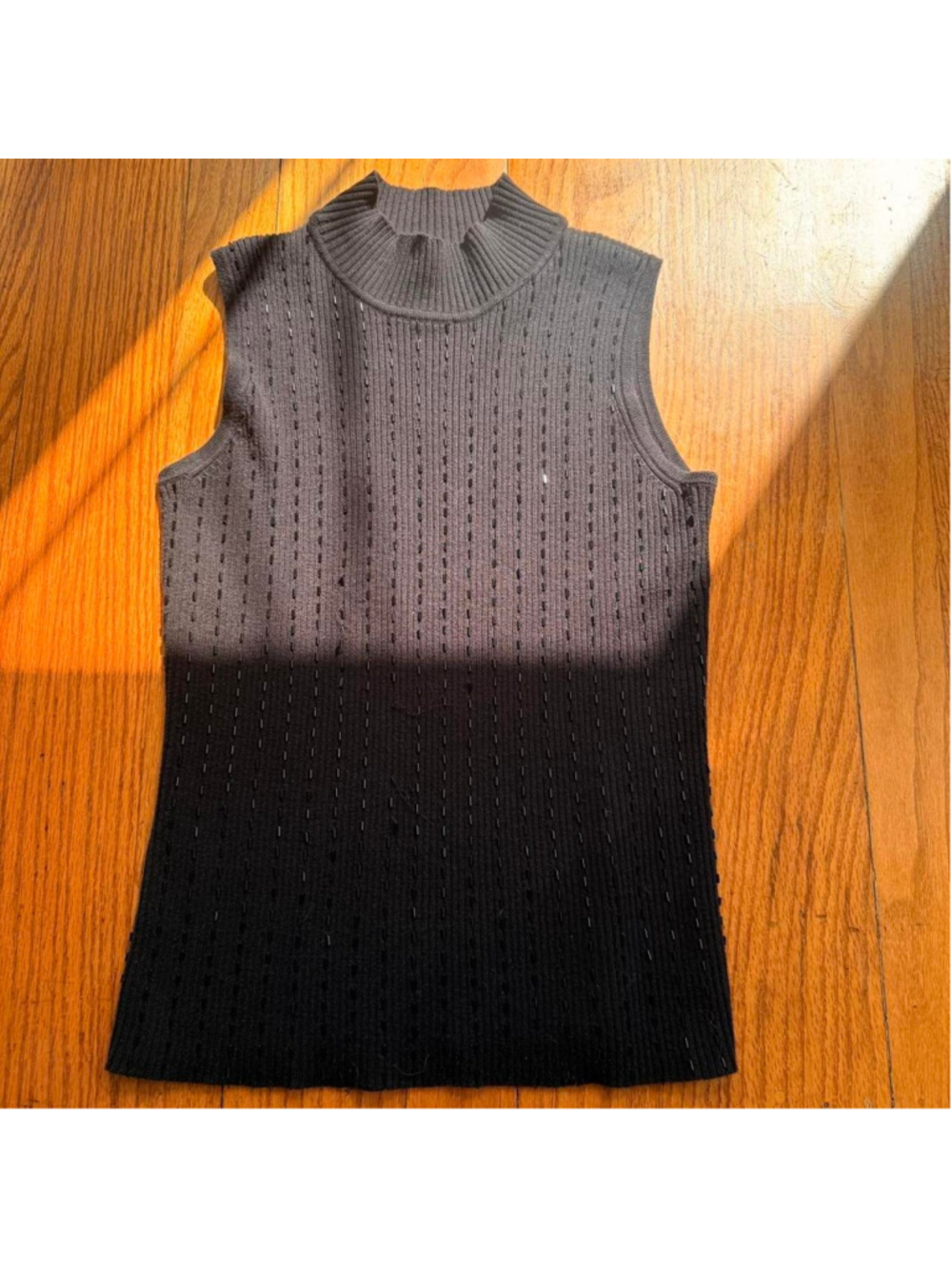 Black turtleneck sweater with sparkly gems throughout